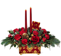 Miami Christmas: A wonderful holiday mix of red carnations and roses, gold pinecones, gold glass balls and seasonal greens surrounding burgundy taper candles. Its all beautifully presented in a footed metal planter silkscreened with a baroque pattern in burgundy and gold metallic. 8"W x 4"D x 4 1/4"H. Set includes planter, two candles...